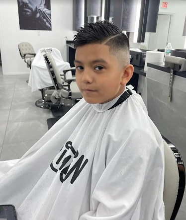 Kids haircut — young boy in chair